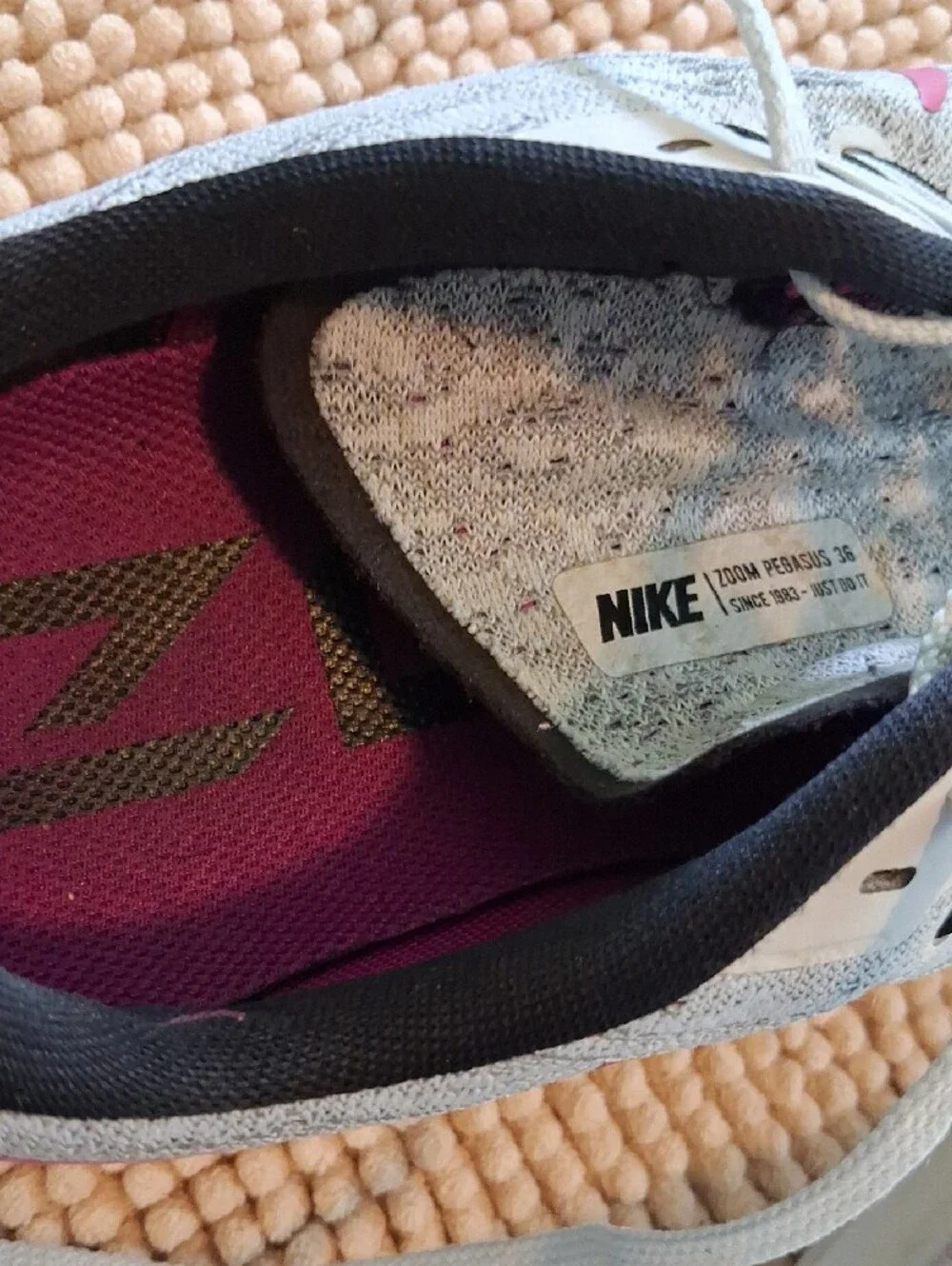 Nike Gray Athletic Running Shoes with Pink Swoosh